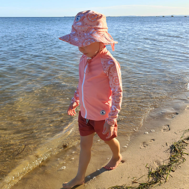 REVERSIBLE SWIM HAT - COMMUNITY CONNECTED TO LAND